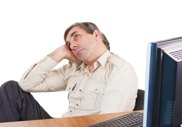 A business man in an office works at the computer — Stock Photo, Image