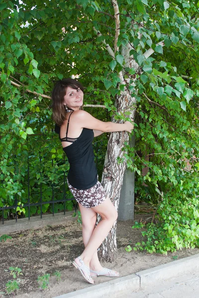 Woman near a birch — Stock Photo, Image