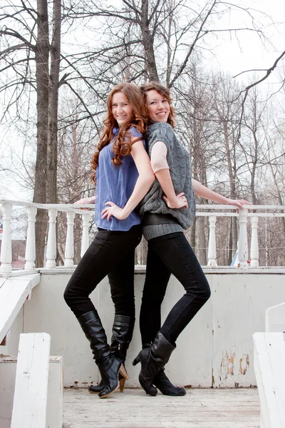 Two beautiful women in a park — Stock Photo, Image