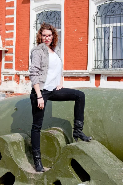 Woman in a museum of military equipment — Stock Photo, Image