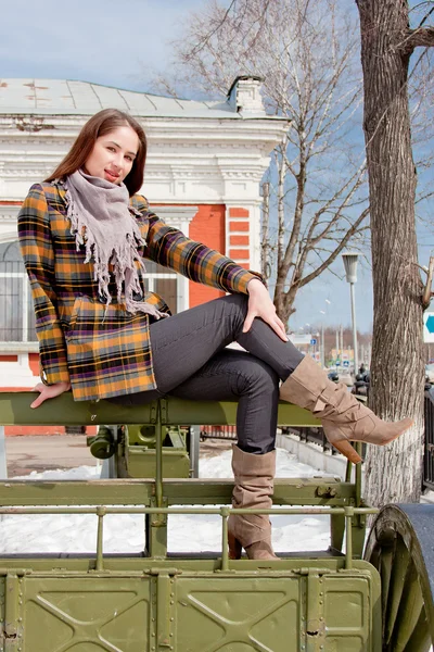 Woman in a museum of military equipment — Stock Photo, Image