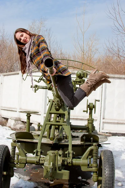 Woman in a museum of military equipment — Stock Photo, Image