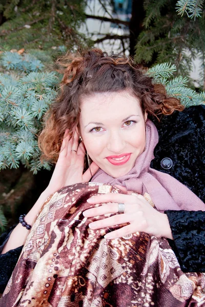 Woman about a decorative tree — Stock Photo, Image