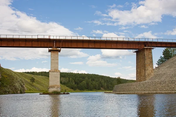 Railway bridge on a background blue sky — Stock Photo, Image