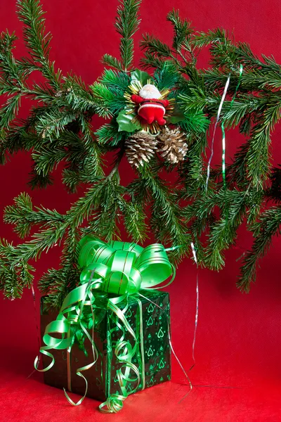 Christmas still life on a red background — Stock Photo, Image