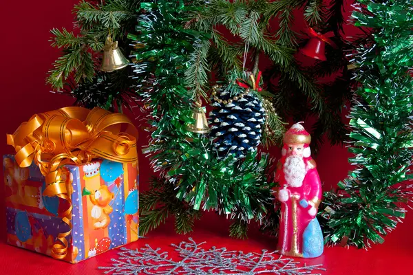 Christmas still life on a red background — Stock Photo, Image