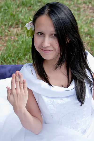 Young woman in the dress of fiancee in summer in a park — Stock Photo, Image