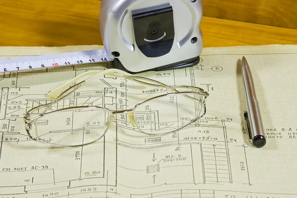 Roulette, pen and glasses on project documentation — Stock Photo, Image