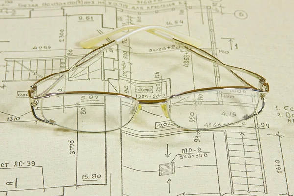 Glasses on project documentation — Stock Photo, Image