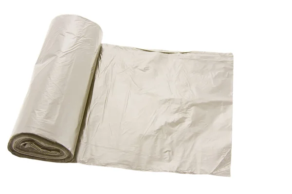 Мешки для мусора в рулонах на белом фоне, изолированные — стоковое фото
