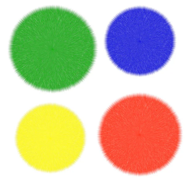 Cuatro bolas mullidas varicolores sobre un fondo blanco —  Fotos de Stock