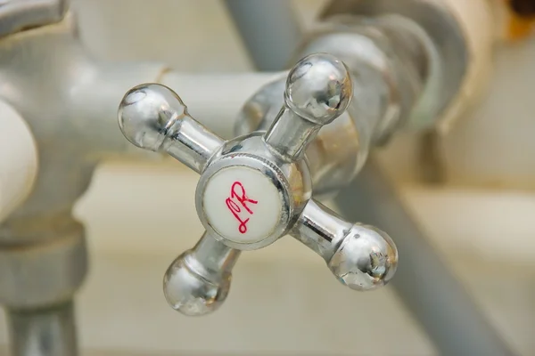 Old faucet in a bathroom — Stock Photo, Image