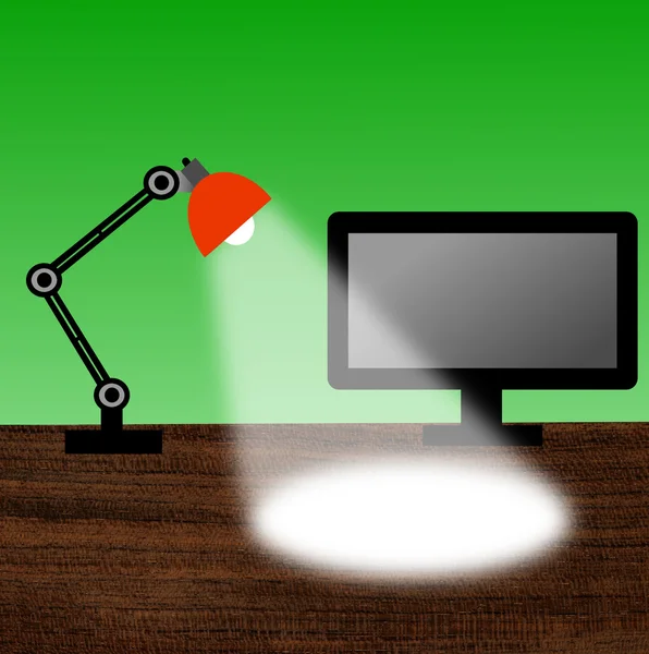 Leeslamp en computer op een tafel — Stockfoto