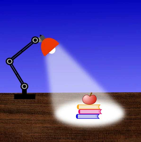 Läslampa, tre böcker och apple på ett bord — Stockfoto