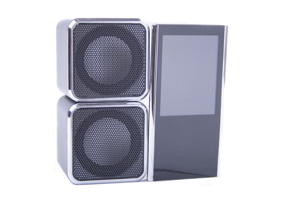 Two square black speakers with mp3 player on white background