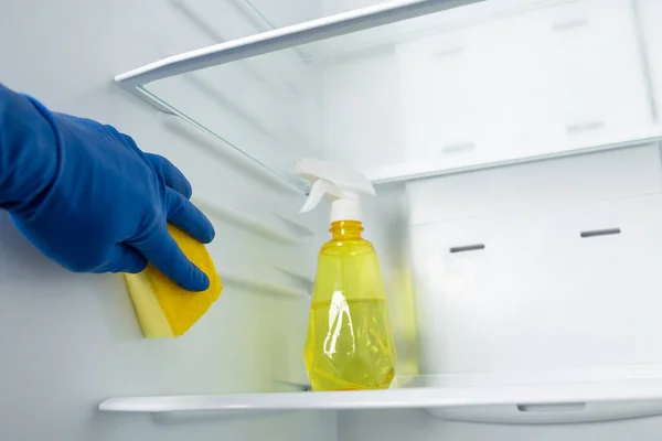 Move out bad odor from refrigerator with spray detergent and sponge.