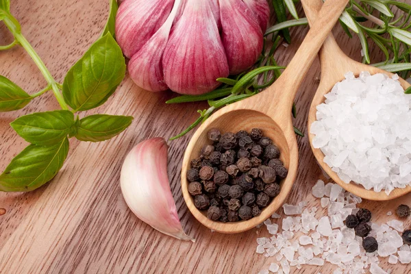 Fresh herbs and salt spoon Stock Picture