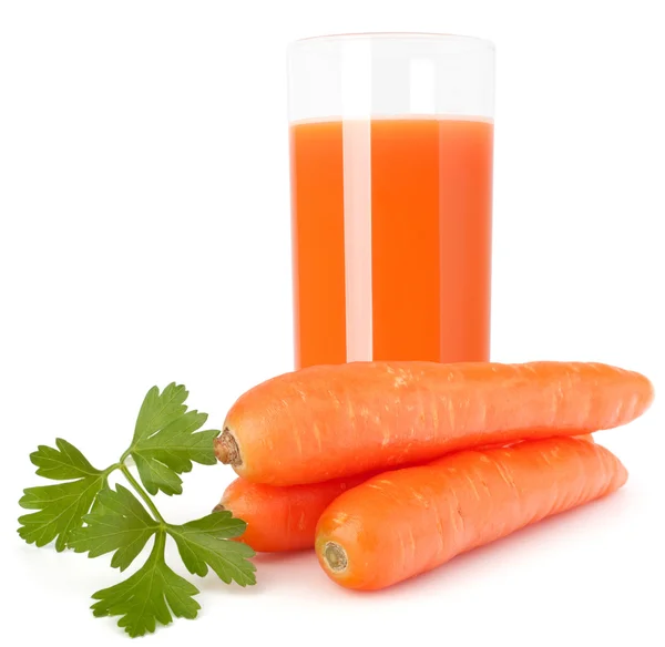 Carrot juice glass and carrot tubers — Stock Photo, Image