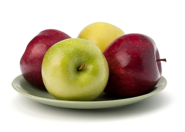 Pila de manzanas en el plato —  Fotos de Stock