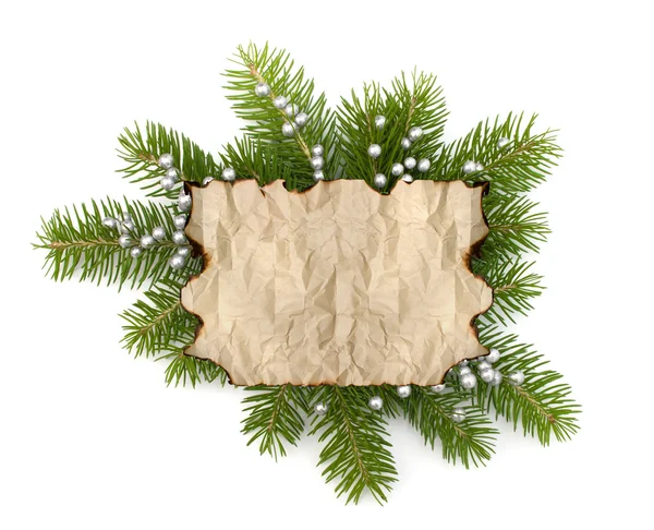 Papel de pergaminho velho com espaço de cópia no bac de ramo de árvore de Natal — Fotografia de Stock