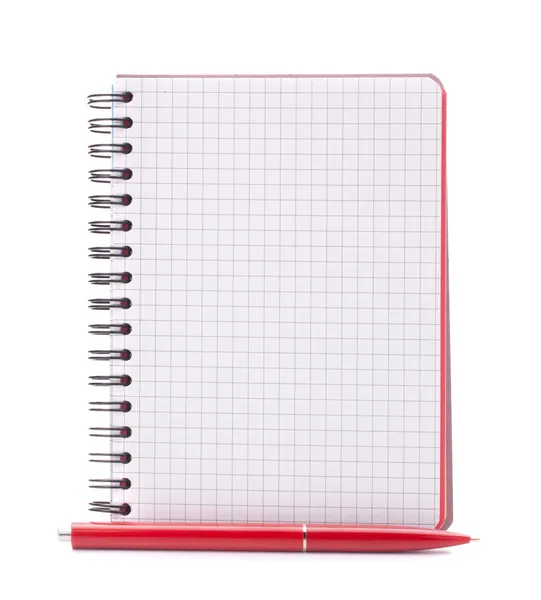 Open blank checked notebook with red pen Stock Image