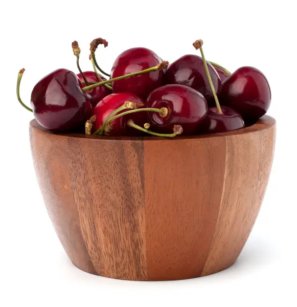 Cherry in wooden bowl — Stock Photo, Image