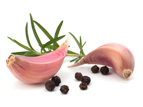 Garlic clove and rosemary leaf — Stock Photo, Image