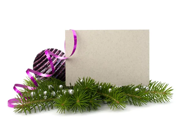 Karácsonyi dekoráció együtt üdvözlőlapot elszigetelt fehér háttérben — Stock Fotó