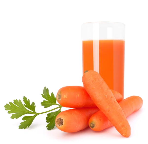 Склянка морквяного соку та бульби з моркви — стокове фото