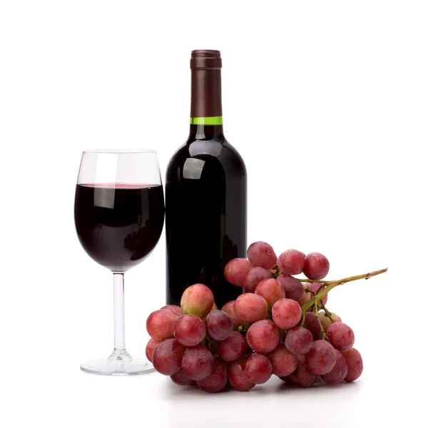 Plné červené víno skleněnou nádobu, láhev a hrozny — Stock fotografie