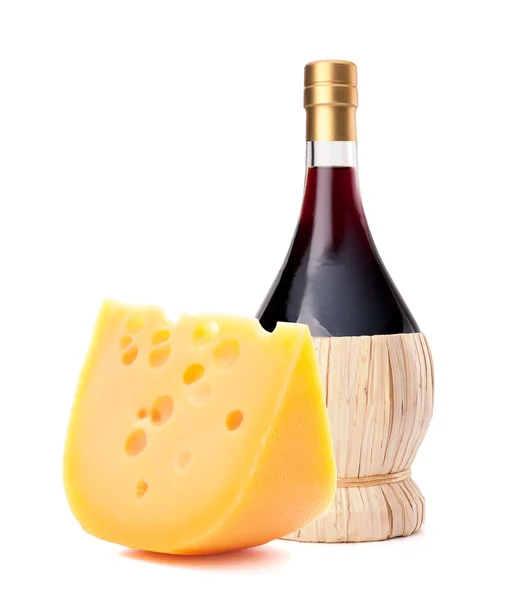 Red wine bottle and cheese still life — Stock Photo, Image