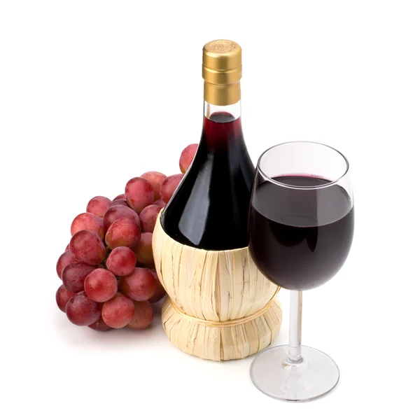 Full red wine glass goblet, bottle and grapes — Stock Photo, Image