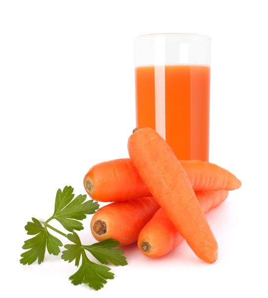 Carrot juice glass and carrot tubers — Stock Photo, Image