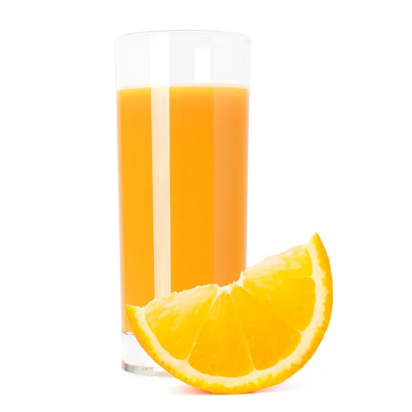 Juice sklo a oranžové plody — Stock fotografie