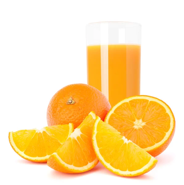 Juice sklo a oranžové plody — Stock fotografie
