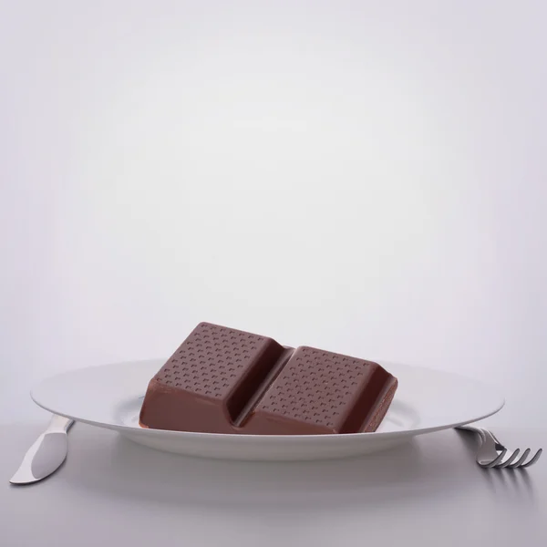 Chocolate bars stack on plate. — Stock Photo, Image