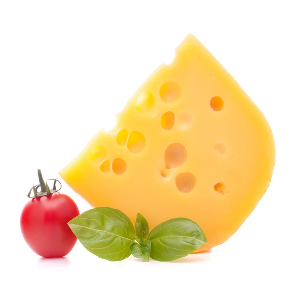 Cheese and basil leaves — Stock Photo, Image