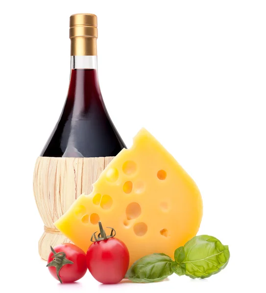 Red wine bottle, cheese and tomato still life — Stock Photo, Image