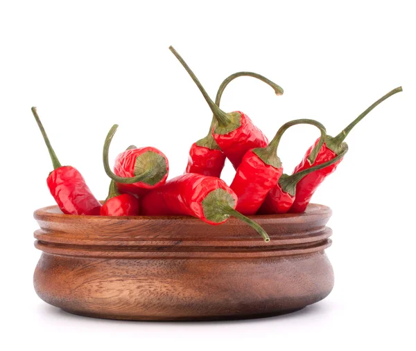 Hot red chili or chilli pepper in wooden bowl — Stock Photo, Image