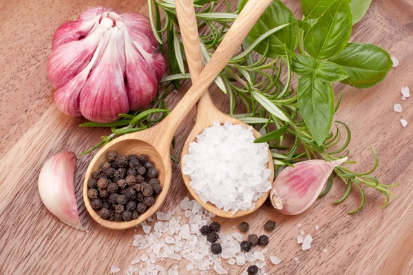 Fresh herbs and salt spoon