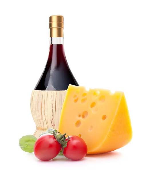 Red wine bottle, cheese and tomato still life — Stock Photo, Image