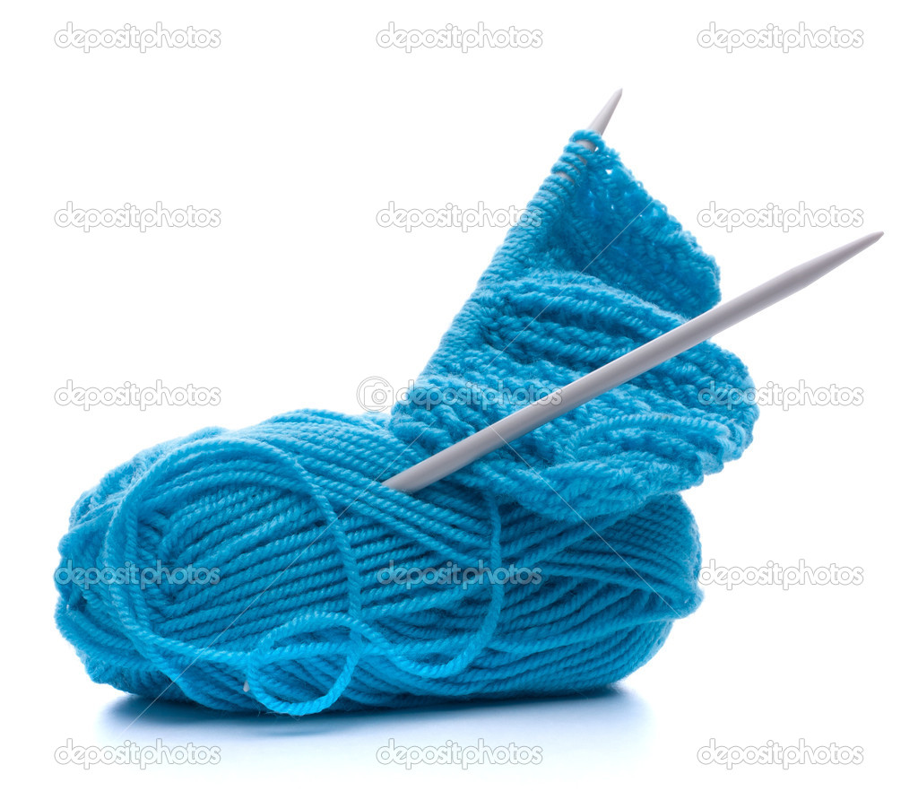 Woollen thread and knitting needle. Needlework accessories.