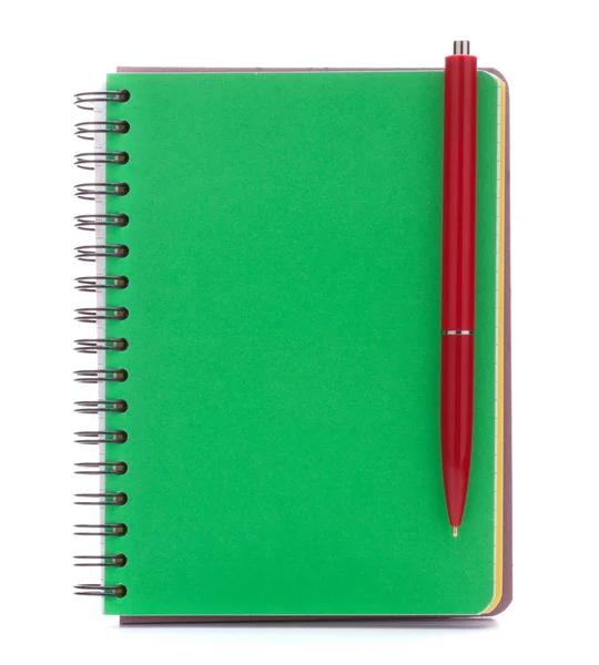 Blocco note di copertina verde con penna rossa — Foto Stock