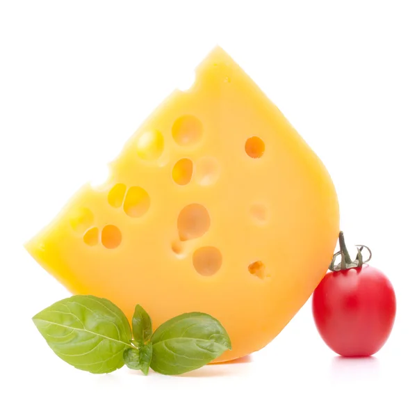 Cheese and basil leaves — Stock Photo, Image