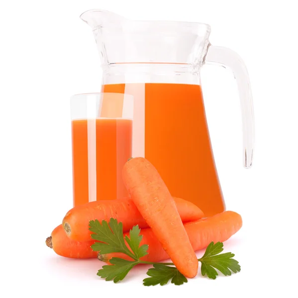 Carrot vegetable juice in glass jug — Stock Photo, Image