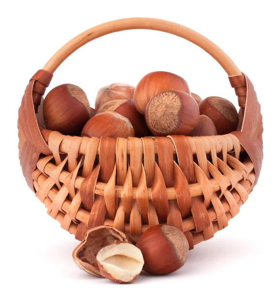 Hazelnuts in wicker basket — Stock Photo, Image