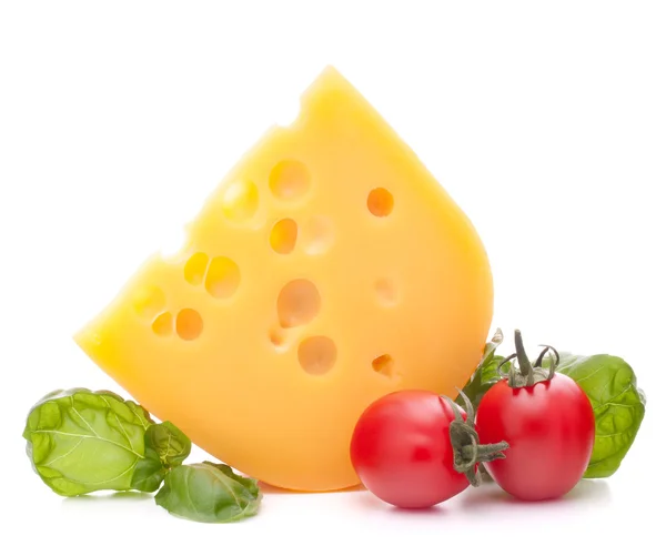 Cheese and basil leaves still life — Stock Photo, Image