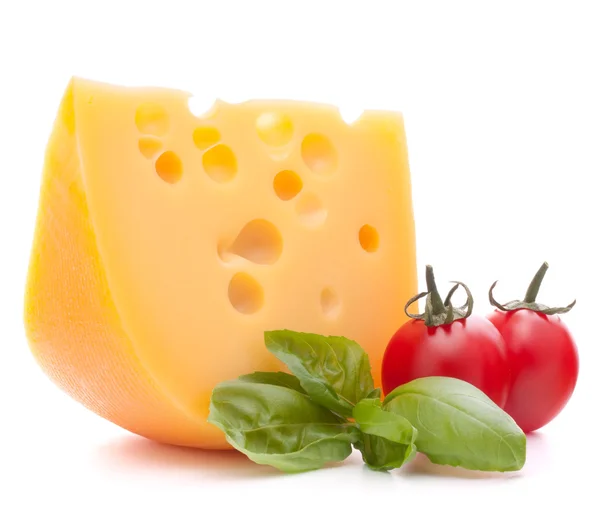 Cheese and basil leaves still life — Stock Photo, Image