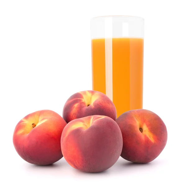 Персиковый сок в стакане — стоковое фото