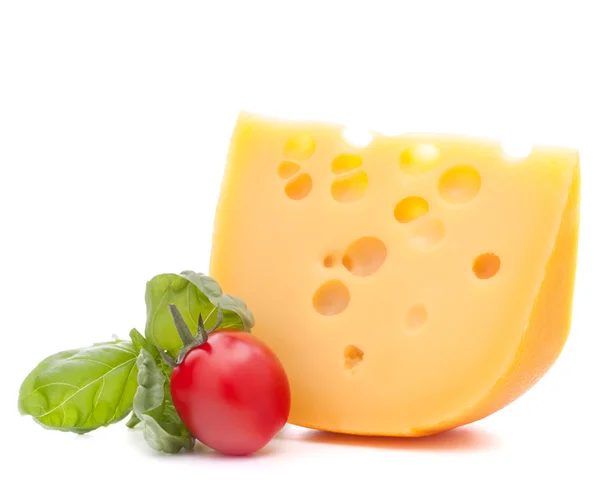 Cheese and basil leaves still life — Stock Photo, Image